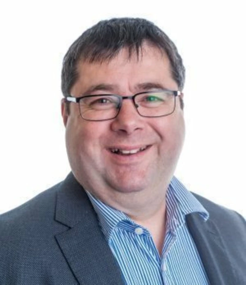 Headshot of Andrew Spencer