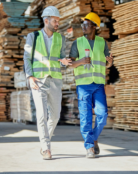 Construction industry workers discussing financial plans