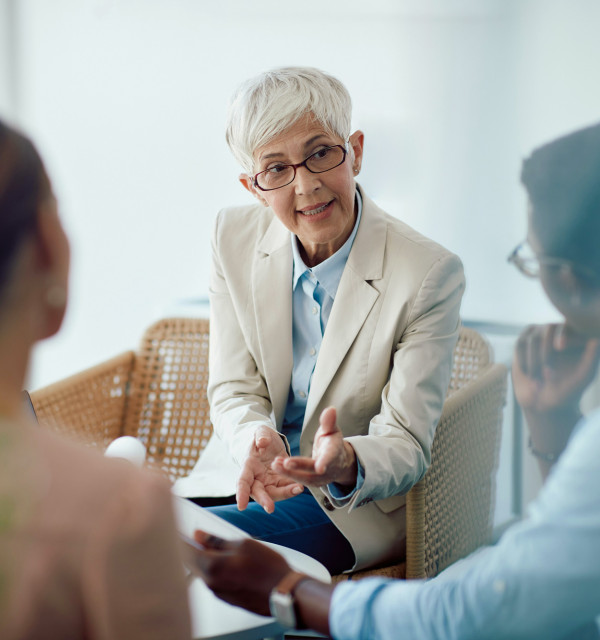 An accountant performing a risk management assessment with a client